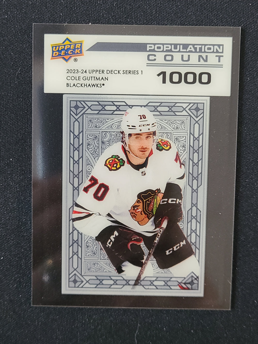 2023-24 Upper Deck Series 1 Population Count 1000 #PC-3 Cole Guttman Chicago Blackhawks