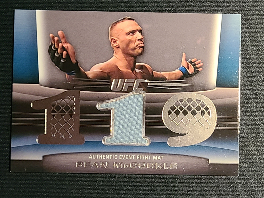 2011 Topps UFC Title Shot Authentic Fight Mat Silver UFC 119 #FM-SM Sean McCorkle 39/88