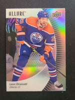 
              2023-24 Allure Base Variations Including Black Rainbow, Red Rainbow, and Orange Slice (List)
            