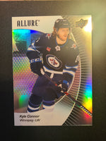 
              2023-24 Allure Base Variations Including Black Rainbow, Red Rainbow, and Orange Slice (List)
            