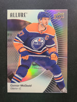 
              2023-24 Allure Base Variations Including Black Rainbow, Red Rainbow, and Orange Slice (List)
            