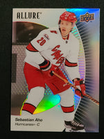 
              2023-24 Allure Base Variations Including Black Rainbow, Red Rainbow, and Orange Slice (List)
            