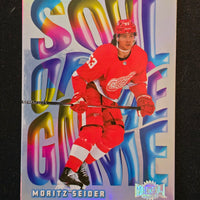 2023-24 Skybox Metal Universe Soul of the Game #23 Moritz Seider Detroit Red Wings