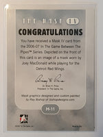 
              2006-07 ITG The Mask IV #M-11 Joey MacDonald Detroit Red Wings
            
