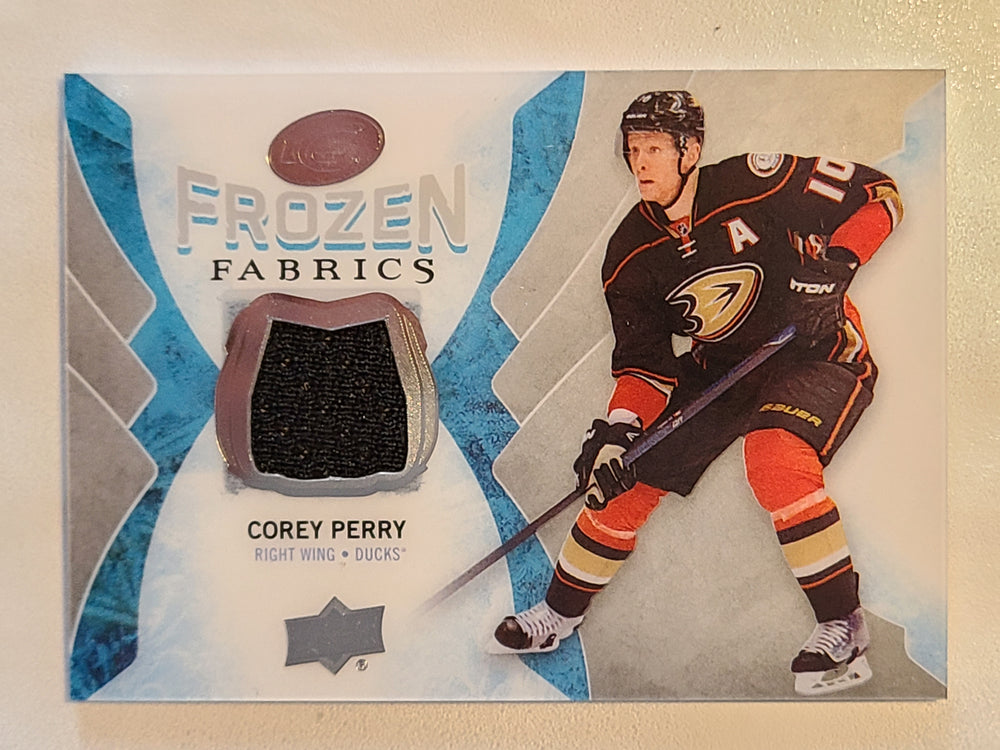 2016-17 ICE Frozen Fabrics #FF-CP Corey Perry Anaheim Ducks
